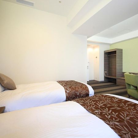 Hotel Sunshine Ucunomija Pokoj fotografie