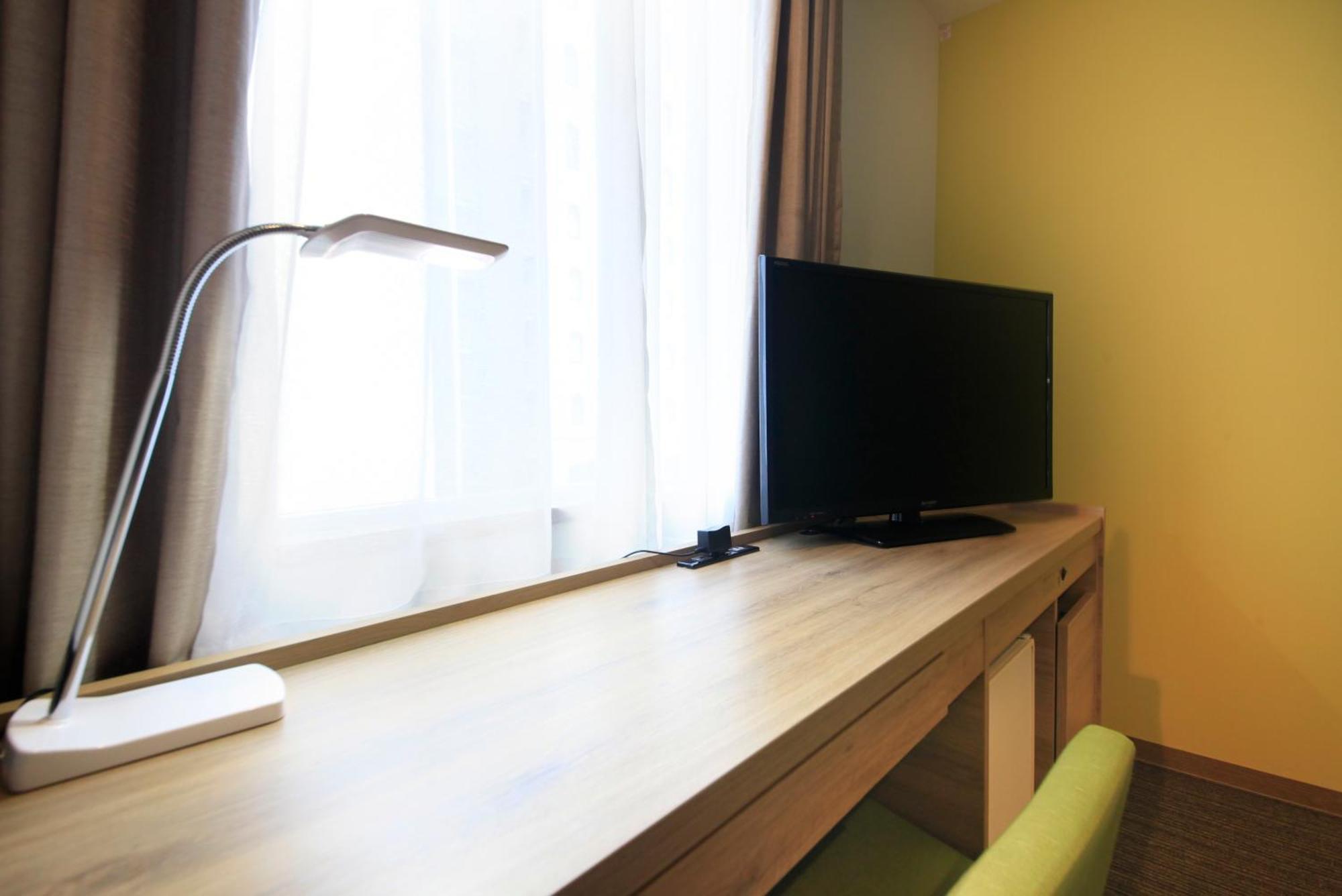 Hotel Sunshine Ucunomija Pokoj fotografie