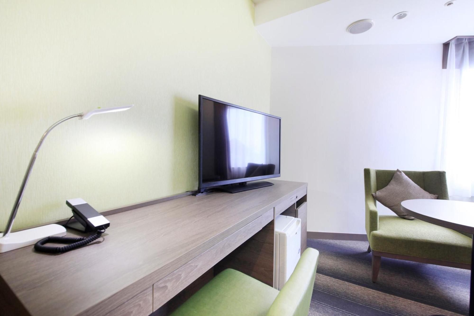 Hotel Sunshine Ucunomija Pokoj fotografie